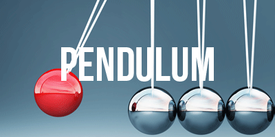 Photo of four hanging balls. Three silver ones sit together. A red one, on the left of the other three, has been lifted up and is about to hit into the three silver balls. The word 'Pendulum' is written in the middle of the photo